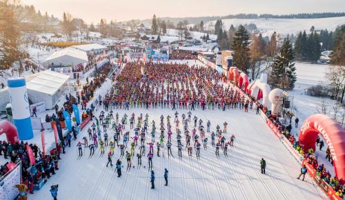 a large group of people in a crowd at a skiing event at Penzion Koucký in Bedřichov