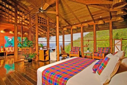 Кровать или кровати в номере Anse Chastanet Resort