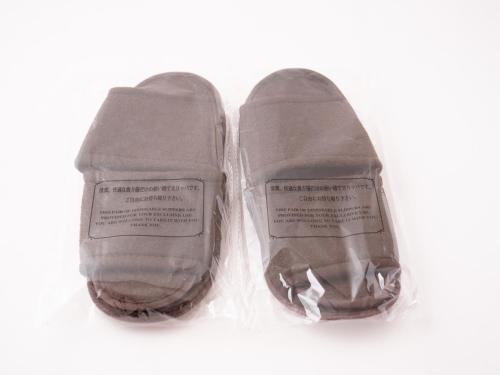 a pair of shoes in a plastic bag at Hotel Front Inn Fukuoka Airport in Fukuoka