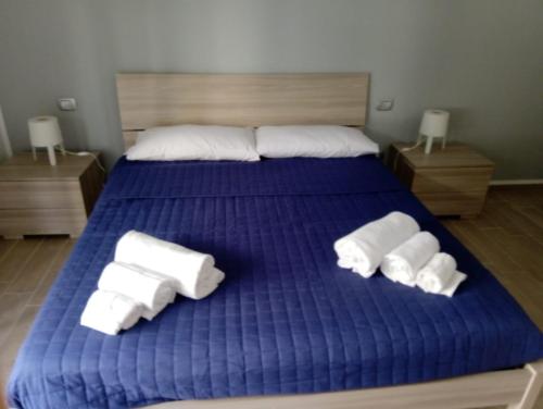Ein Bett oder Betten in einem Zimmer der Unterkunft Da Nonno Giacomo
