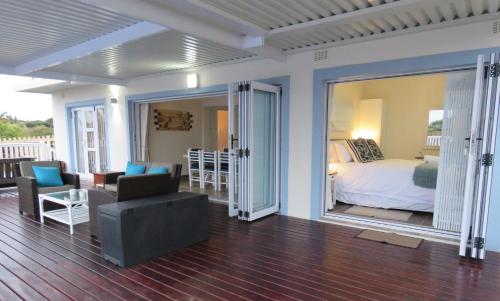 Ένα ή περισσότερα κρεβάτια σε δωμάτιο στο Seagulls Beach House