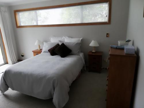 Posteľ alebo postele v izbe v ubytovaní Whaka Heights