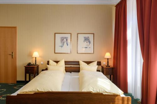 Ringhotel Dreiländereck Zittauにあるベッド