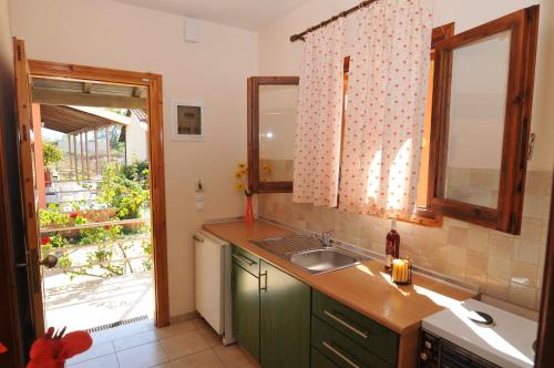 A kitchen or kitchenette at HYGGE Corfu