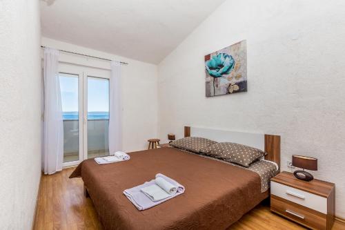 Кровать или кровати в номере Private accommodation STARA BASKA