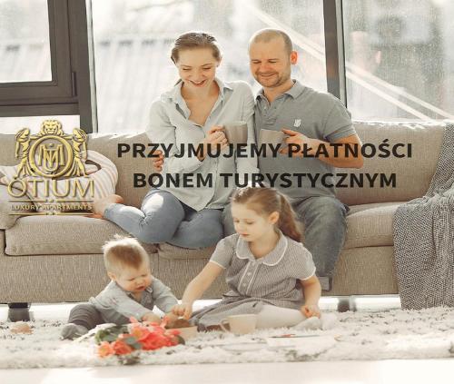 A family staying at Main Square One Minute by Otium