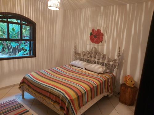 Krevet ili kreveti u jedinici u okviru objekta Casa na praia de Itamambuca na cidade de Ubatuba