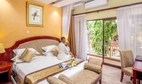 Voodi või voodid majutusasutuse Hotel Africana toas