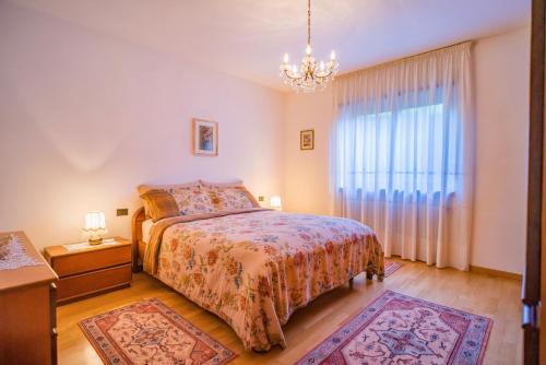 Ένα ή περισσότερα κρεβάτια σε δωμάτιο στο B&B Nonno Carlo