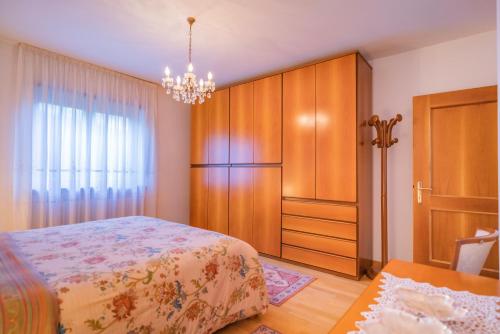 Ένα ή περισσότερα κρεβάτια σε δωμάτιο στο B&B Nonno Carlo