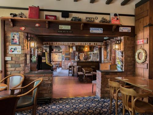 Lounge nebo bar v ubytování The Olde Peculiar