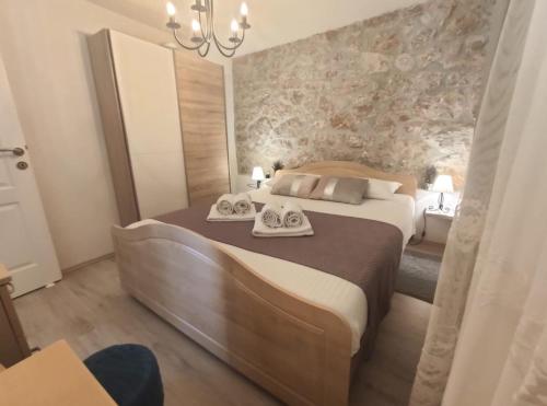 Posteľ alebo postele v izbe v ubytovaní Charming apartment piccolo paradiso