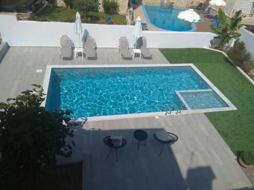Fotografie z fotogalerie ubytování Raisakis Apartments v destinaci Agia Marina Nea Kydonias