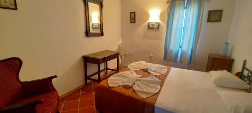 Postel nebo postele na pokoji v ubytování Şato Triopia Butik Otel