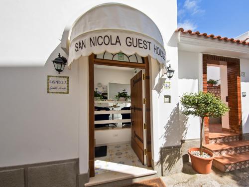 a building with a sign that reads san nicola guest house at San Nicola Guest House in Anacapri