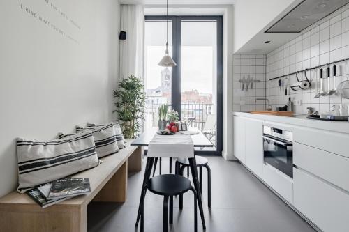 Η κουζίνα ή μικρή κουζίνα στο MAISON12 - Design apartments with terrace and view over Ghent towers
