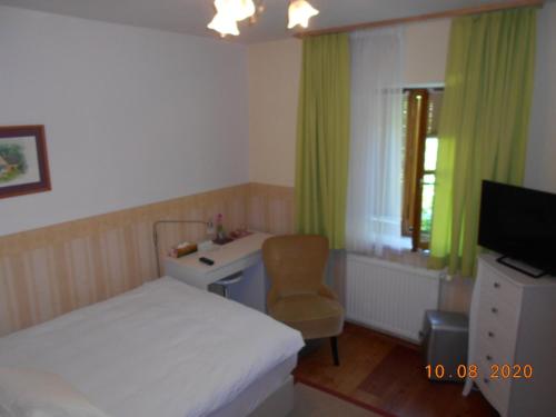 Ein Bett oder Betten in einem Zimmer der Unterkunft Haus Loidl