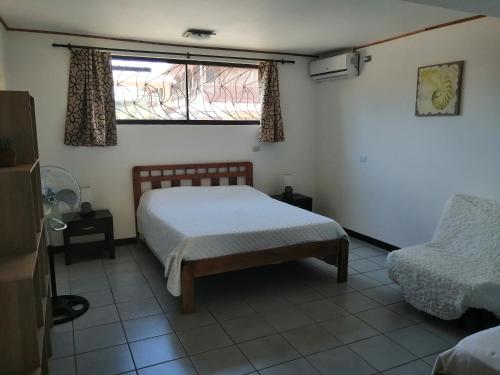 Postel nebo postele na pokoji v ubytování Marfi Inn