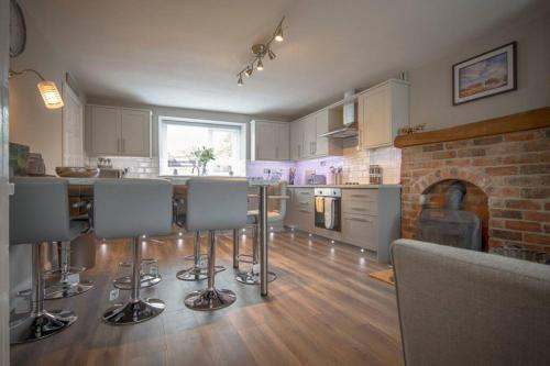 A kitchen or kitchenette at Neds Brae View in the Glens of Antrim Family and Pet friendly Carnlough home