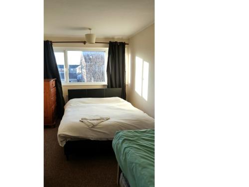 Postel nebo postele na pokoji v ubytování Thornley Avenue