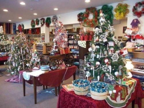 a store with decorated christmas trees in a room at Tin Brook Bed & Breakfast in Walden