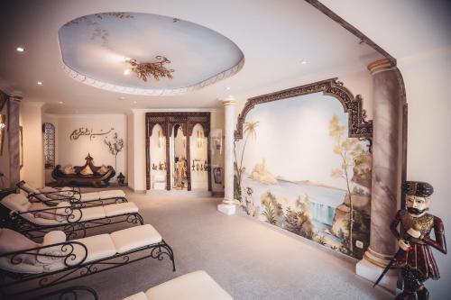 a room with a bunch of beds in it at Hotel Zur Heimat in Weiden