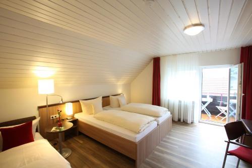Ein Bett oder Betten in einem Zimmer der Unterkunft Kloster Schöntal
