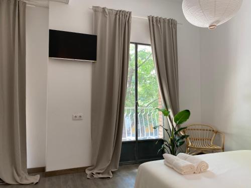 Ένα ή περισσότερα κρεβάτια σε δωμάτιο στο Shanti Rooms
