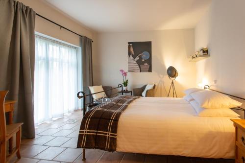 Ένα ή περισσότερα κρεβάτια σε δωμάτιο στο Landhotel Teichwiesenhof, Bed&Breakfast