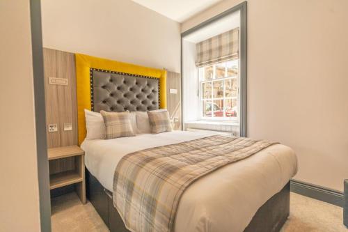Кровать или кровати в номере Court Residence Aparthotel