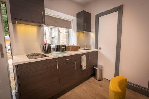 Кухня или мини-кухня в Court Residence Aparthotel
