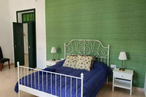 Кровать или кровати в номере Casa El Billar