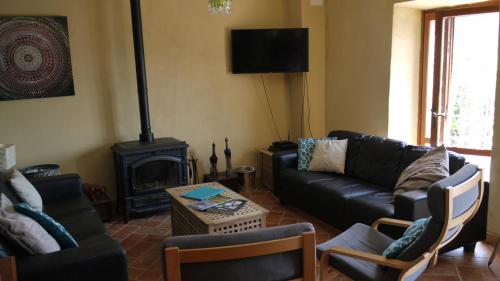 Posezení v ubytování piscina con vista