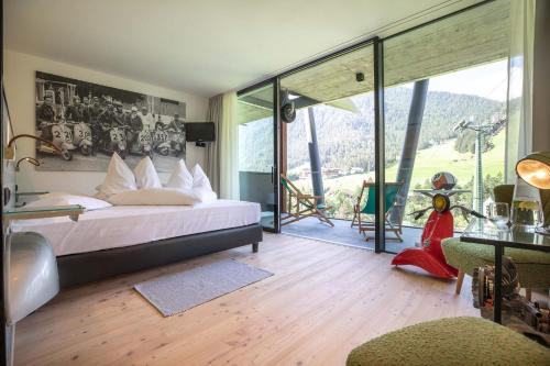 Кровать или кровати в номере Al Plan, A mountain moving hotel