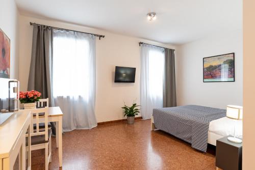 Postel nebo postele na pokoji v ubytování Marinali Rooms