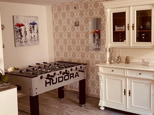 a kitchen with a gas stove in a room at Ferienhaus Sauerland-Träume in Schmallenberg