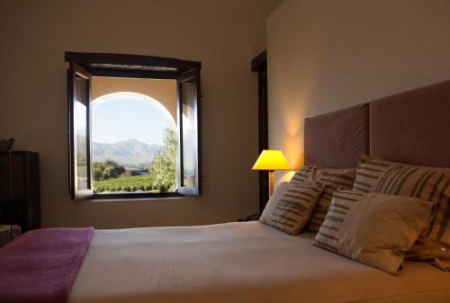 
A bed or beds in a room at Estancia Colome
