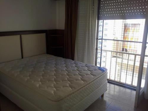 En eller flere senge i et værelse på Apartamento Miramar Calle 21