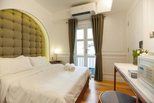 Cama o camas de una habitación en White Mansion Penang