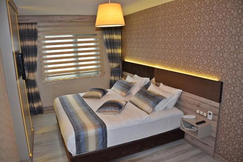 Katil atau katil-katil dalam bilik di 61 Park Hotel