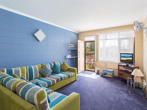 Μια τηλεόραση ή/και κέντρο ψυχαγωγίας στο Forster Holiday Lodge 09