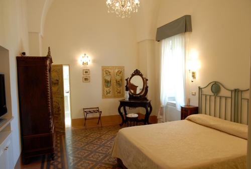 מיטה או מיטות בחדר ב-Masseria Salamina
