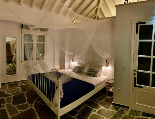 Postel nebo postele na pokoji v ubytování Kalimera homes