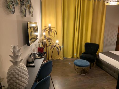 TV a/nebo společenská místnost v ubytování SUITE LAME 37 Rental Rooms