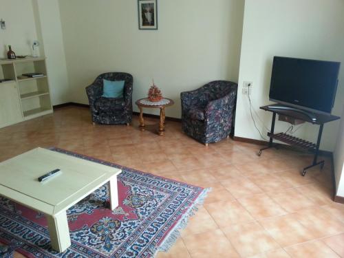 TV a/nebo společenská místnost v ubytování Hotel Bodoni