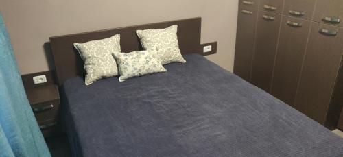 Кровать или кровати в номере HOME APARTAMENT