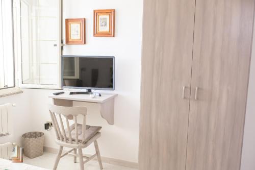 Μια τηλεόραση ή/και κέντρο ψυχαγωγίας στο B&B La Quercia Budoni, Tanaunella