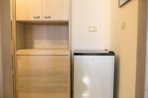 Η κουζίνα ή μικρή κουζίνα στο B&B La Quercia Budoni, Tanaunella