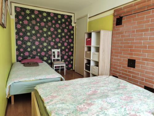Кровать или кровати в номере Maria Apartment at Rootsi street