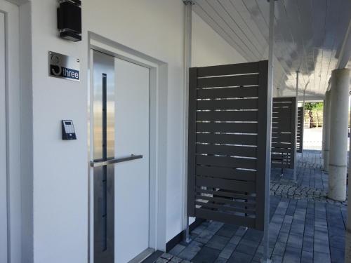 a door in a building with a sign on it at CityMotel Ziegenhain in Schwalmstadt